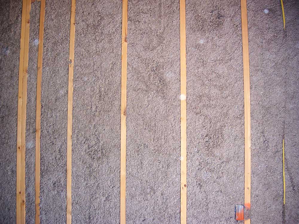 Professional Insulation Contractor Installing Fiberlite WALL-MAT Product